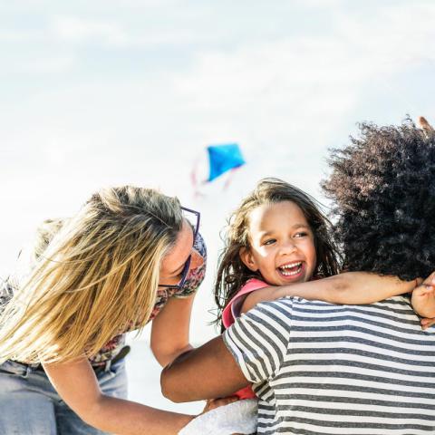Family happy while kite flying