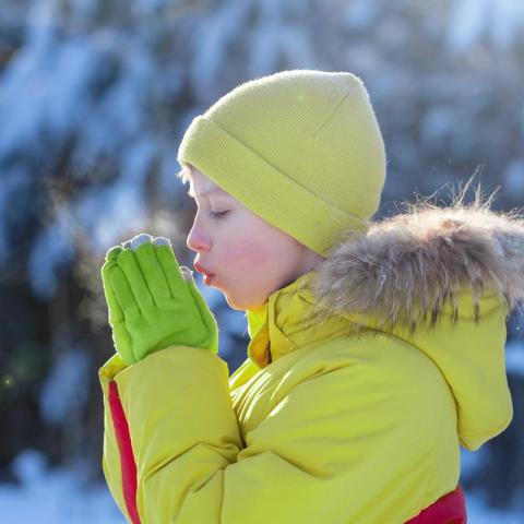 Kid in snowy landscape